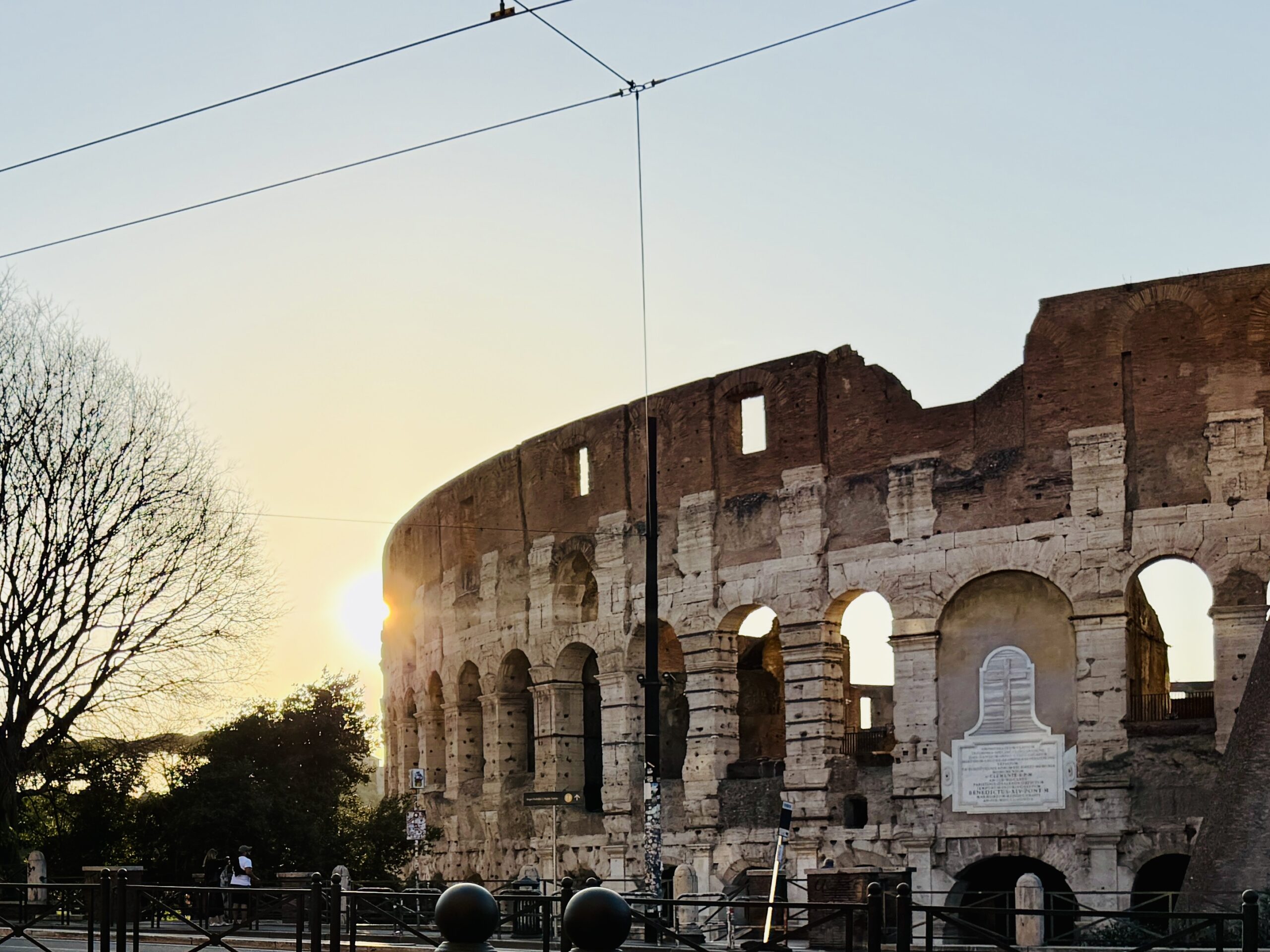 3 Days in Rome Itinerary: What's Worth It, What's Not, and What I'd Do Differently Sun setting down on the Colosseum