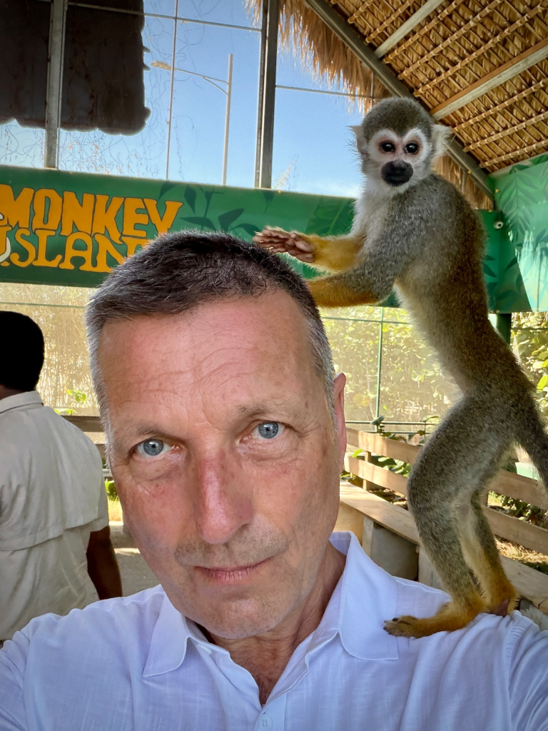 Are Cruises Worth It? Why They May Be the Perfect Vacation! A Monkey Posing on my Shoulder